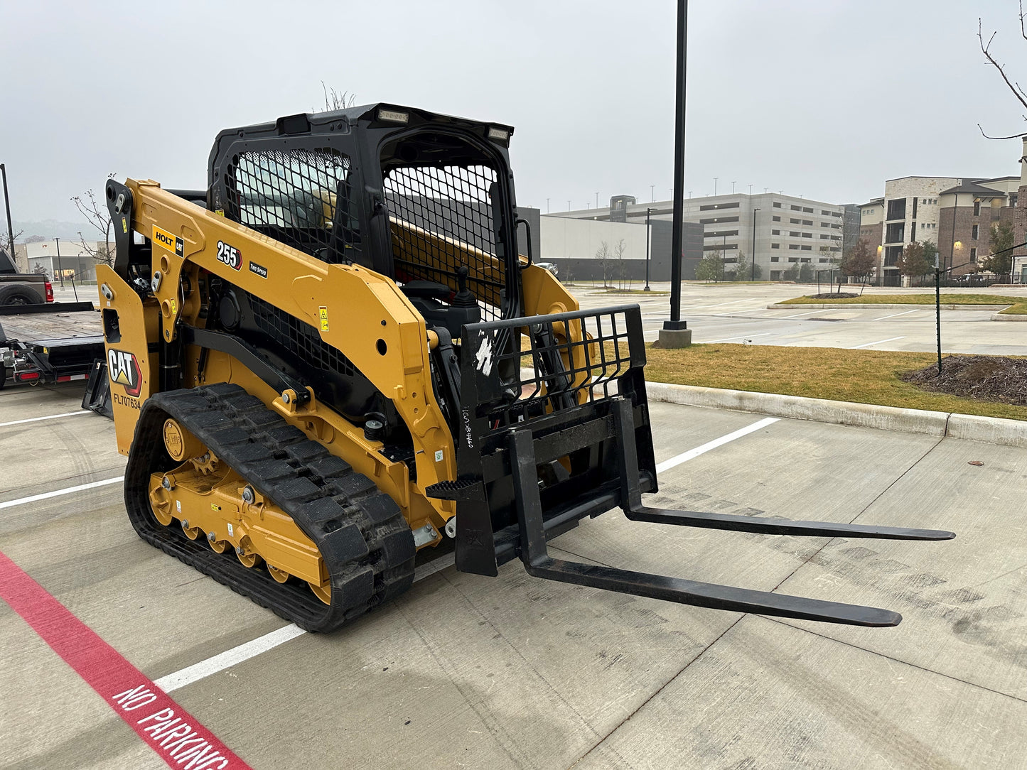 Cargadora de cadenas con cabina cerrada